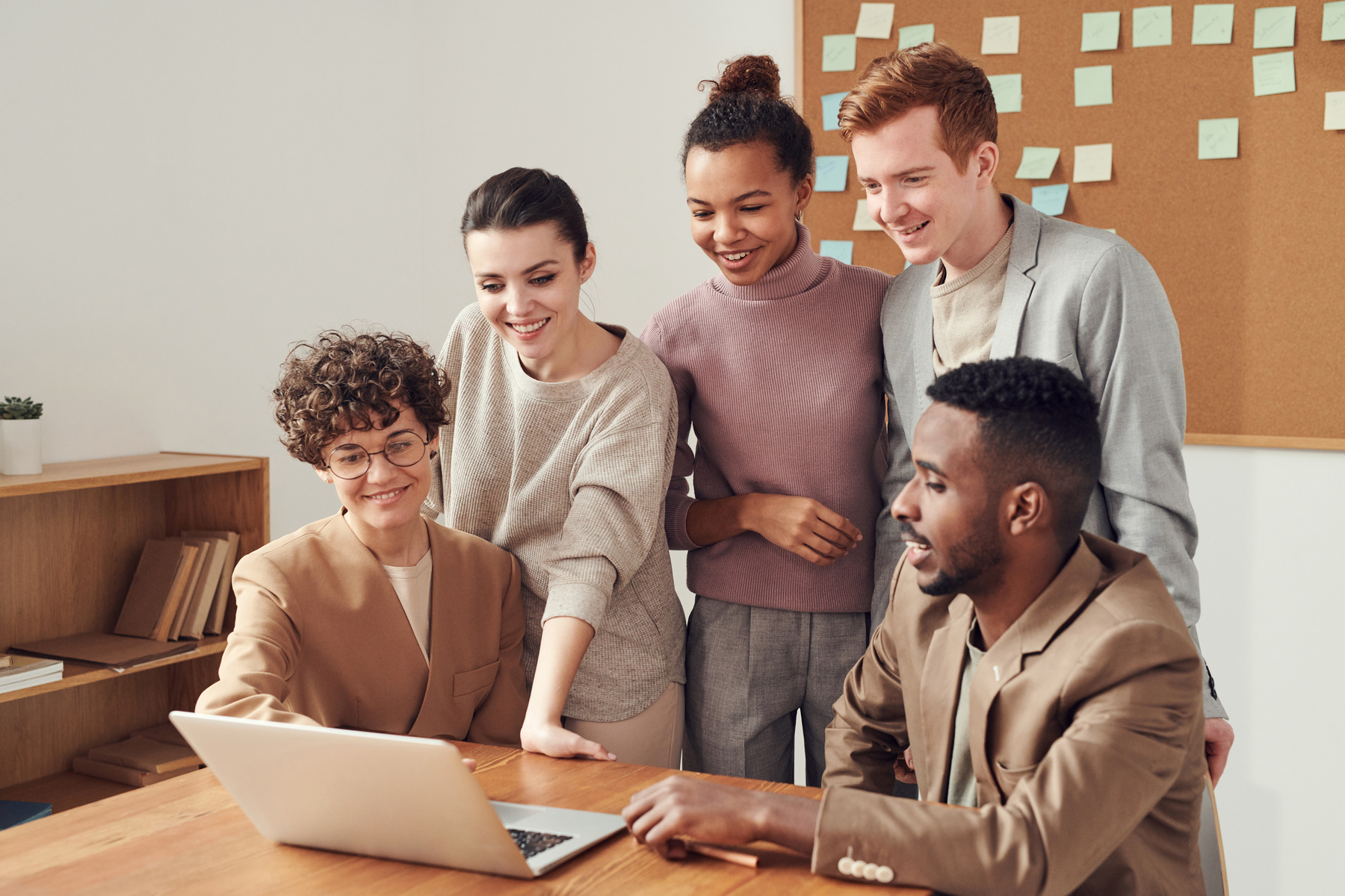 Photo Of People Looking On Laptop